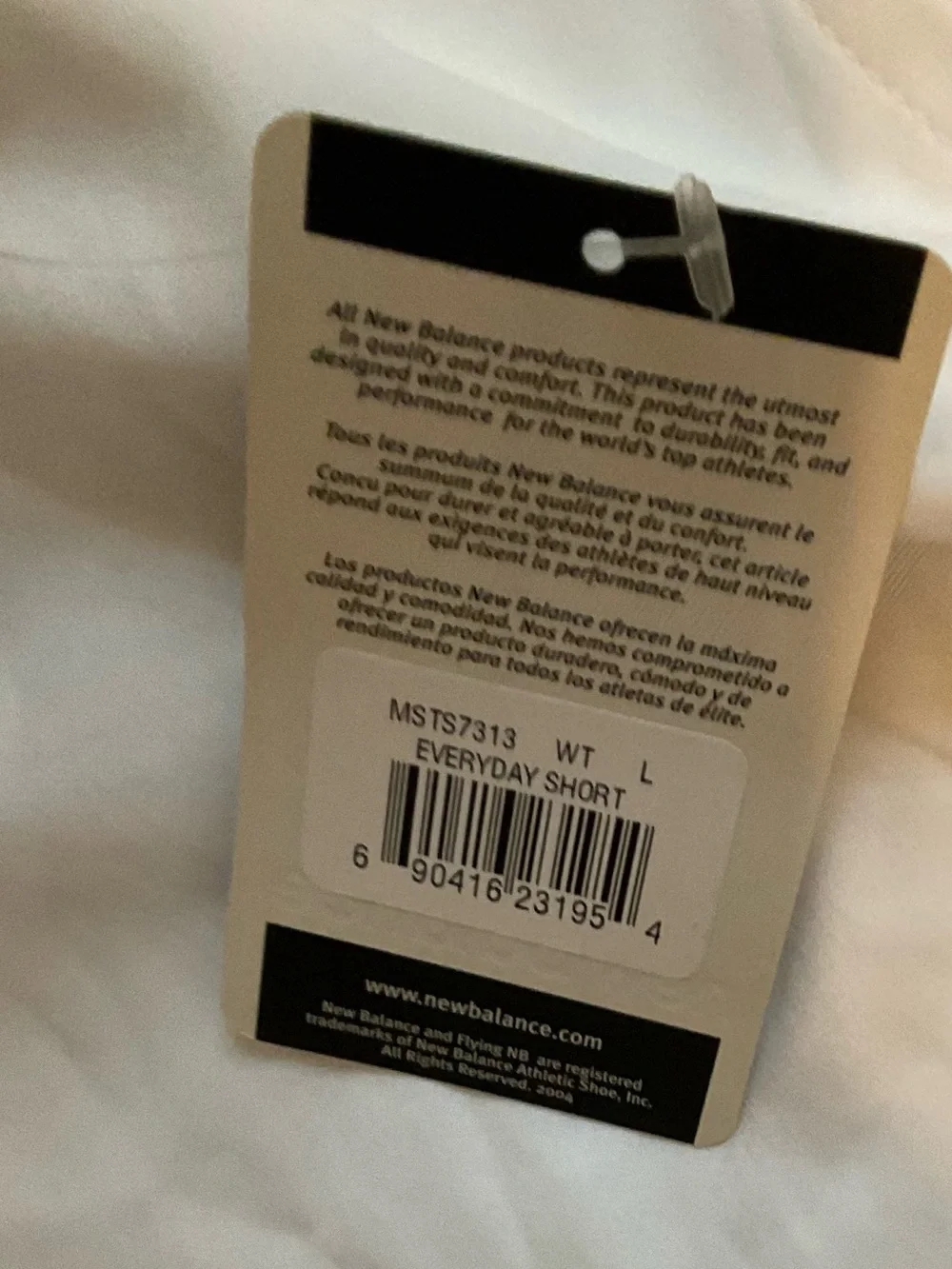 New Balance White Athletic Shorts with Black Logo Tag